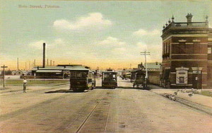 Cable trams in High St, Thornbury, in 1909, looking south. The Lawrence Leathers factory was to be established on land to the left of the photo.